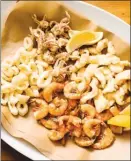  ?? The Associated Press ?? This fried seafood recipe appears in the cookbook Tasting Italy.