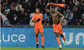  ?? Napoli. Photograph: Ciro Fusco/EPA ?? Marcus Thuram (right) whirls his shirt around his head after scoring Internazio­nale’s third goal against