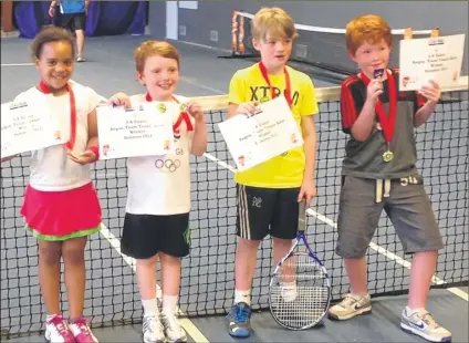  ??  ?? FOUR ACES: Grace Gondo, Henry Bourdillon, Sam Malins and Josh Seal, who beat Blackheath at the Kent 8-and-under tournament in Bromley