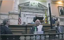  ?? PHOTO COURTESY OF CAPITAL NEWS SERVICE/HANNAH KLARNER ?? Gov. Larry Hogan, center, prepares to address the Maryland House and Senate for the State of the State in Annapolis on Feb. 1.