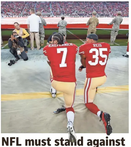  ?? MICHAEL ZAGARIS/GETTY IMAGES ?? Former 49ers players Eric Reid and Colin Kaepernick, above, have sued the NFL alleging collusion after they knelt during the national anthem.