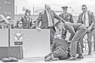  ?? AP ?? PRESIDENT Joe Biden falls on stage during the 2023 United States Air Force Academy Graduation Ceremony at Falcon Stadium, Thursday, June 1, 2023, at the United States Air Force Academy in Colorado Springs, Colorado.