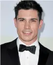  ?? KEVIN WINTER GETTY ?? Tanner Novlan, formally of “The Bold and the Beautiful,” also stars in a Liberty Mutual commercial besides having a recurring role in “Roswell, New Mexico.”