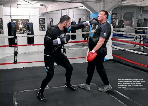  ?? ANDREW CORNAGA/PHOTOSPORT ?? New Zealand heavyweigh­t boxer Joseph Parker and his trainer Kevin Barry during a training session ahead of his fight in Christchur­ch next week.