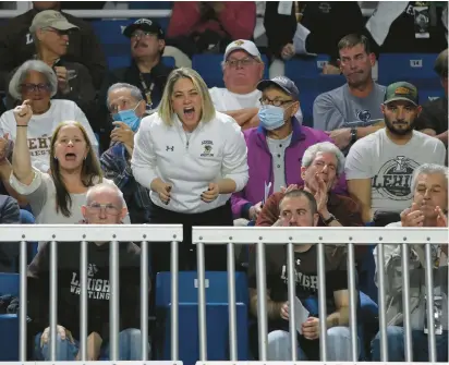  ?? JANE THERESE/SPECIAL TO THE MORNING CALL PHOTOS ?? A sellout crowd cheers Sunday during the Lehigh-Penn State wrestling match at Stabler Arena in Bethlehem. No. 1 Penn State won 24-12.