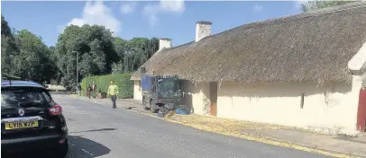  ??  ?? Thatch A council cleaner gets to work early on Sunday