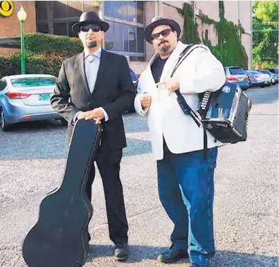  ?? COURTESY OF GATO MALO PRODUCTION­S ?? Felix Peralta, left, and DB Gomez make up Dos Gatos. A virtual concert featuring the duo will be shown Friday, May 8, on Department of Cultural Affairs-affiliated Facebook pages.