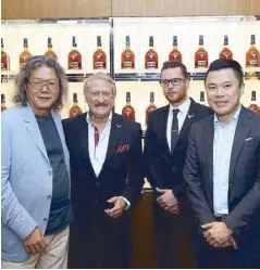  ??  ?? (From left) Jimmy Ng, Richard Paterson, Dalmore resident whiskey expert Adam Knox and Kevin Tan.