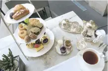  ??  ?? Afternoon tea is decadent on a patio at the Palacio Duhau Park Hyatt.