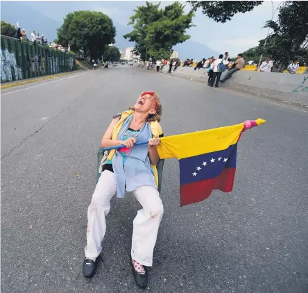 ?? Picture / AP ?? capital Caracas yesterday it was a time to stop the traffic and make the most of the sunshine.