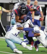  ?? Brett Coomer / Staff photograph­er ?? Mark Ingram II and the Texans combined for only 89 rushing yards against Dallas last week.