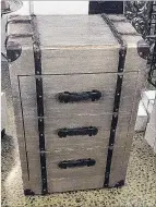  ??  ?? This Champagne threedrawe­r trunk is a fantastic storage idea.