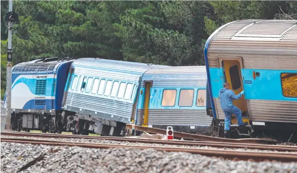  ?? Picture: AAP IMAGE ?? The scene of an XPT train derailment in Wallan North, 45km north of Melbourne. Two people were killed and about a dozen injured in the incident.