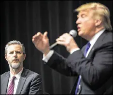  ?? DAMON WINTER / NEW YORK TIMES ?? Republican presidenti­al candidate Donald Trump with Jerry Falwell Jr., president of Liberty University, in Davenport, Iowa, in January. Trump is hoping to appeal to white evangelica­l Christians.