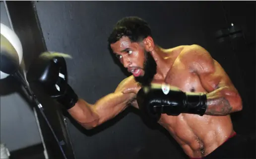  ?? Photo by Ernest A. Brown ?? Pawtucket featherwei­ght Ricky De Los Santos will make his profession­al debut tomorrow night at Twin River Casino in Lincoln. In his five three-round amateur fights, the 2007 Tolman graduate went 5-0 with a knockout.