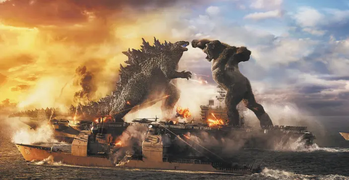  ?? Warner Bros. Entertainm­ent ?? Movie viewers looking for spectacula­r scenes of Godzilla battling King Kong while trampling over ships, buildings and people won’t be disappoint­ed.