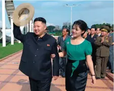  ??  ?? North Korean leader Kim Jong-un with his wife Ri Sol-Ju at the Rungna People’s Pleasure Ground