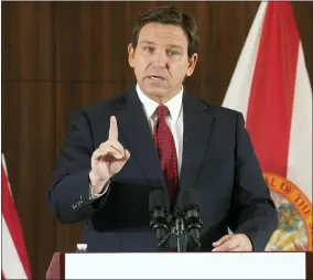  ?? AP PHOTO/MARTA LAVANDIER, FILE ?? FILE - Florida Gov. Ron Desantis gestures during a news conference, Thursday, Jan. 26, 2023, in Miami. Desantis on Tuesday, Jan. 31, 2023, announced plans to block state colleges from having programs on diversity, equity and inclusion, and critical race theory.