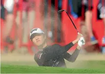  ?? GETTY IMAGES ?? Lydia Ko hits out of a bunker during her first-round 68 at the British Open that put the New Zealander in eighth equal.