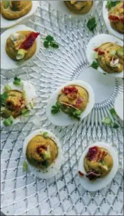  ?? CARRIE CROWDER — KATIE WORKMAN VIA AP ?? Add this recipe of Classic Deviled Eggs by Katie Workman to your repertoire.