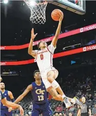  ?? NORM HALL GETTY IMAGES ?? Boogie Ellis of USC scores on a layup against Georgia Tech in the Jerry Colangelo Classic played in Phoenix.