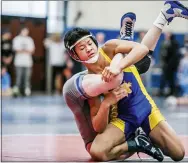  ?? NATE HECKENBERG­ER — MEDIANEWS GROUP FILE PHOTO ?? Downingtow­n East’s Keanu Manuel scrambles against Central Mountain’s Derek Keen earlier this season. Manuel reached the semifinals of the 106-pound bracket of the Class 3A Southeast Regional semifinals.