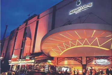  ??  ?? Downtrend: The income for Sungei Wang Plaza, seen here, fell by about a third to RM4.74mil. Tropicana City Property and The Mines also recorded lower incomes in the second quarter.