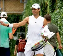  ?? Reuters ?? Spain’s Rafael Nadal arrives for practice. —