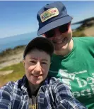  ?? Photograph: Sue Littleton ?? Candice Zaina, left, with their wife, Sue Littleton. The Pride flag outside of their cafe has been vandalized four times.