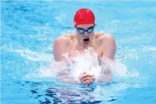  ?? (Getty) ?? Scott finished 0.24 seconds behind Shun Wang