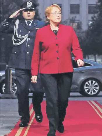  ?? FOTO: AGENCIAUNO ?? ►► La Presidenta de la República, Michelle Bachelet, ingresando al Palacio de la Moneda el 3 de julio pasado.