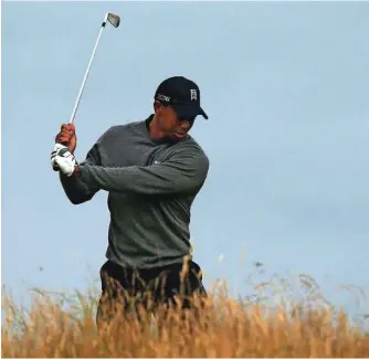  ?? Foto Brian Snyder/Reuters ?? ● Tiger Woods je od malega specialist. Oče ga je
že od drugega leta uril v golfista.