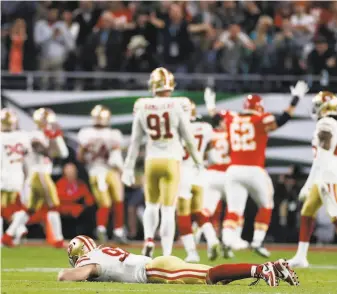  ?? Scott Strazzante / The Chronicle ?? Niners rookie pass rusher Nick Bosa is floored by Damien Williams’ clinching 38yard touchdown run in the fourth quarter in which San Francisco was outscored 210.