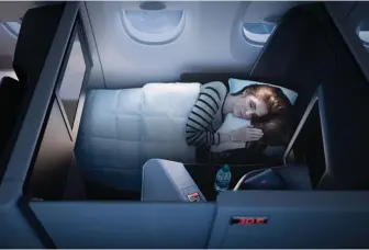  ??  ?? In lie-flat position, the tailored B/E Aerospace Super Diamond seats extend to 80 inches in length, the equivalent of a queen-size bed, and the longest seats on offer over the east coast of Australia. Virgin Australia also boasts the widest seat on US...