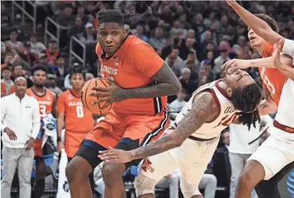  ?? BRIAN FLUHARTY/USA TODAY SPORTS ?? Illinois Fighting Illini forward Dain Dainja (42) fouls Iowa State Cyclones guard Keshon Gilbert (10) in the semifinals of the East Regional of the 2024 NCAA Tournament at TD Garden on Thursday.