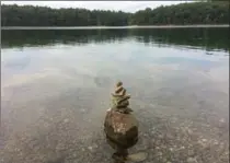  ?? ANNE BOKMA ?? A calm day at Walden Pond.