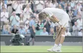  ?? KIRSTY WIGGLESWOR­TH — THE ASSOCIATED PRESS ?? Sebastian Korda reacts after winning a men’s singles third-round match against Daniel Evans at the Wimbledon Championsh­ips in London on Friday.