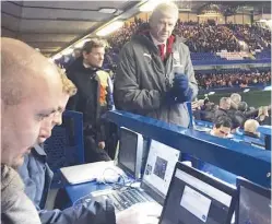  ??  ?? Arsène Wenger takes his seat in the Stamford Bridge press box before Arsenal’s 0-0 draw with Chelsea.