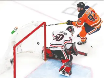  ?? JEFF VINNICK/GETTY IMAGES ?? Edmonton’s Connor Mcdavid had his first NHL playoff hat trick against the Chicago Blackhawks on Monday at Rogers Place as the Oilers won the game 6-3 and tied the best-of-five series 1-1.