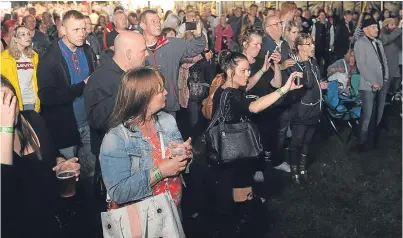  ?? Picture: Kim Cessford. ?? Music fans at the tribute band festival in Lochee Park.