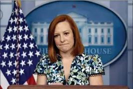  ?? ANDREW HARNIK — THE ASSOCIATED PRESS FILE ?? White House press secretary Jen Psaki listens to a question from a reporter during a press briefing in the White House in Washington.