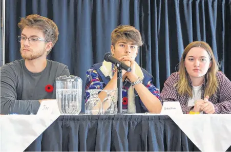  ?? LAWRENCE POWELL PHOTOS ?? Joe Cooper, Sebastian Conyers, and Emma Rice were members of the youth panel at the Climate Action Summit at Cornwallis Park Nov. 9. They talked about their need to be listened to, climate crisis actions to be taken, and what they are already giving up as the climate crisis worsens.