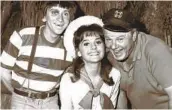  ?? AP FILE ?? Dawn Wells (center) poses with “Gilligan’s Island” castmates Bob Denver and Alan Hale Jr. in 1965.