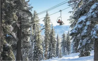  ?? Vail Resorts ?? Skiers and snowboarde­rs climb the mountain by lifts at Northstar California.