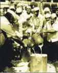  ?? PTI ?? Farmers pour milk on a road during a protest in Ahmednagar, Maharashtr­a