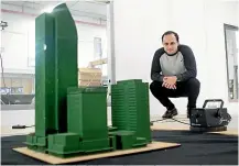  ?? CHRIS MCKEEN/STUFF ?? Dr Ahmad Zaki, left, tests models of cities such as Auckland to determine how buildings will cope in strong winds. Doctoral candidate Muizz Shah, right, in the wind tunnel at Auckland University.