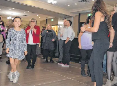  ?? CAPE BRETON POST PHOTO ?? Davis Sullivan, 8, dances while traditiona­l band Coig plays during the launch of the Saltwire Network’s Open Up Project at the Holiday Inn in Sydney on Thursday night. Sullivan is the daughter of Post reporter Nikki Sullivan.