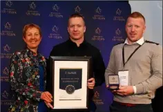  ??  ?? Keith and David Dwyer of Summit Scaffoldin­g receiving All-Ireland Business Foundation All-Star accreditat­ion at Croke Park from Dr Briga Hynes of University of Limerick.