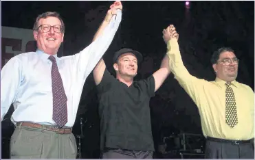  ?? Picture: PA ?? INSPIRATIO­NAL: David Trimble, Bono and John Hume celebrate in Belfast in May 1998