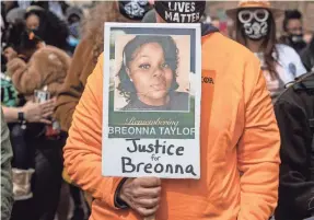  ?? ALTON STRUPP/USA TODAY NETWORK ?? Protesters demonstrat­e March 13 in Louisville, Ky., on the anniversar­y of Breonna Taylor being killed in her apartment by police officers.